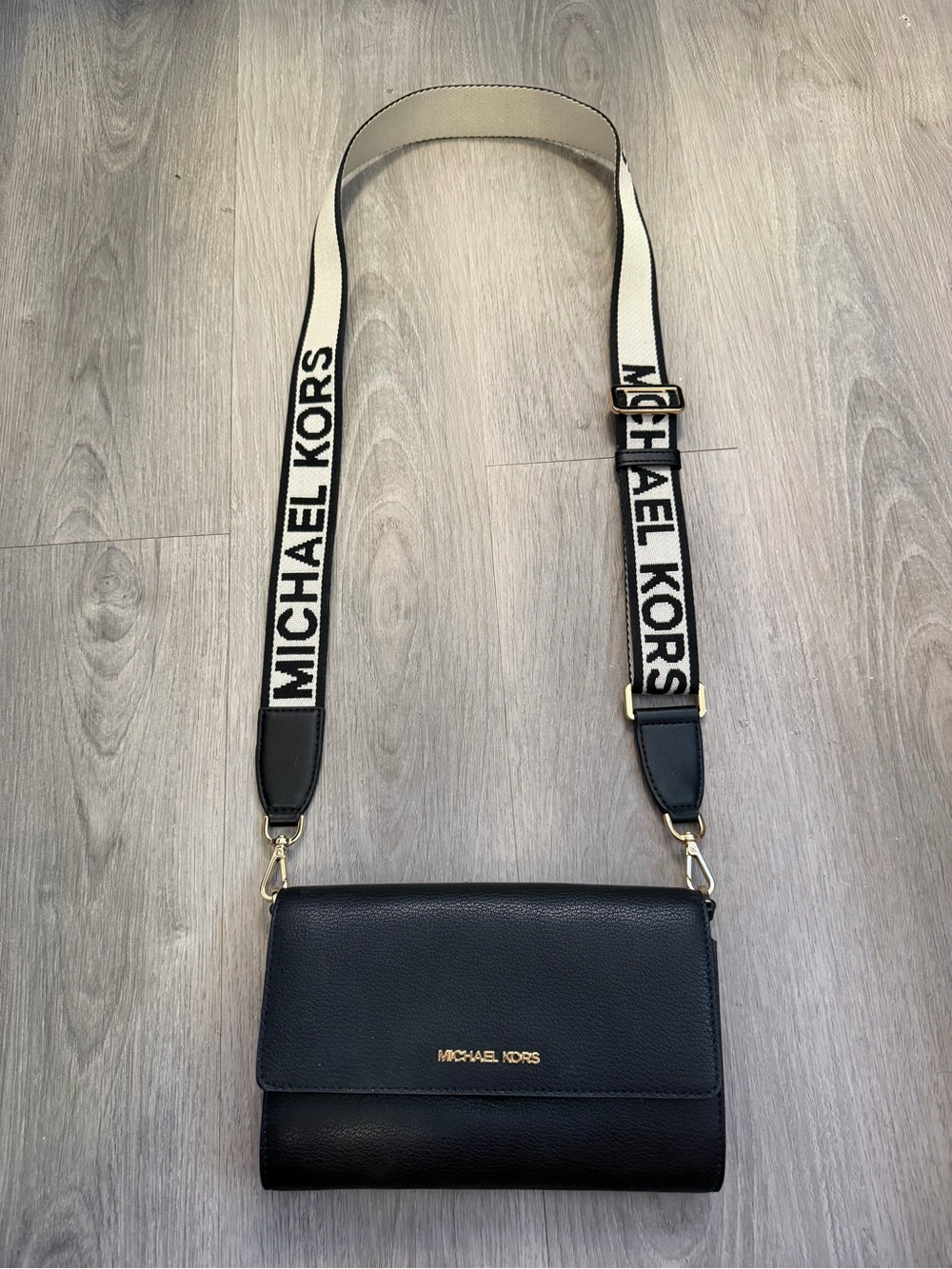 Michael Kors Black Leather Crossbody with Branded Ivory Strap